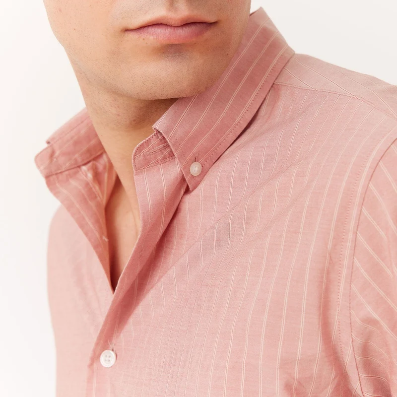 Chemise rose à rayures