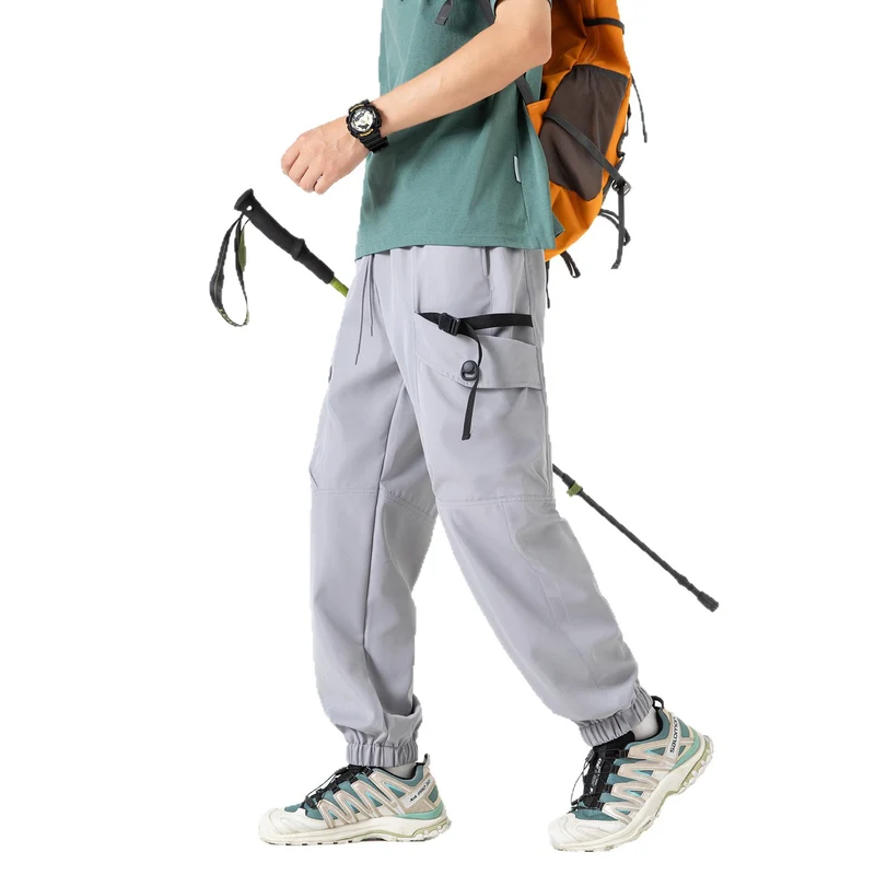 Unisex Weite Technical-Cargo-Jogginghose mit verstellbarem Tunnelzug, großen Klapptaschen und elastischem Knöchelabschluss Nord Taschen