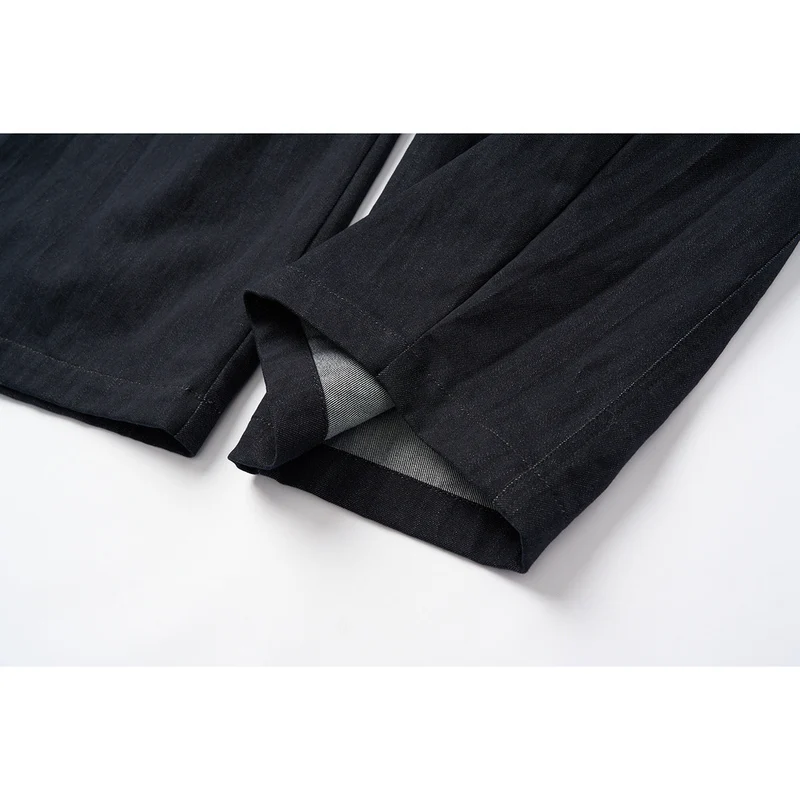 Damen Hochtaillierte weite Culotte-Hose aus Denim‑Mix mit Bundfalten und Knopfverschluss Nord Taschen