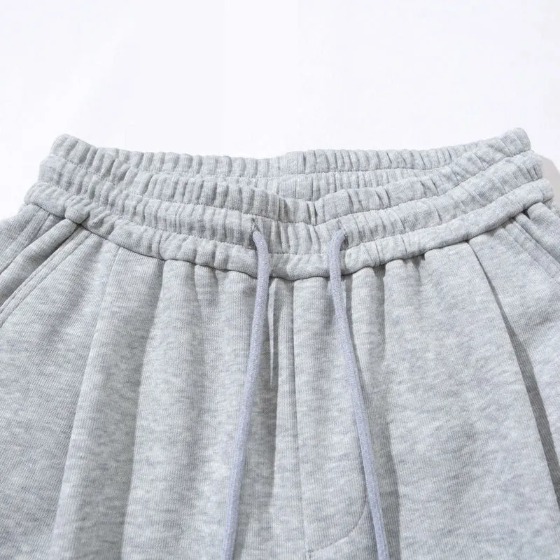 Damen Weite Cropped-Sweathose mit Tunnelzug, Cargo-Taschen und Reißverschluss-Details Nord Taschen