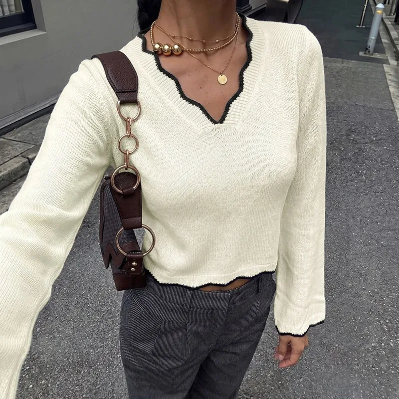 Damen Feinstrick-V‑Pullover mit gewelltem Saum, ausgestellten Ärmeln und Zierpaspel Nord Taschen