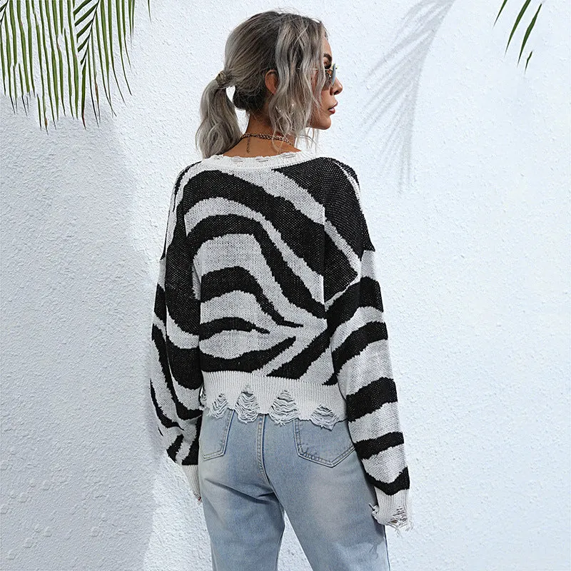 Damen Oversize V-Ausschnitt Strickpullover mit Zebramuster und ausgefranstem Saum Nord Taschen