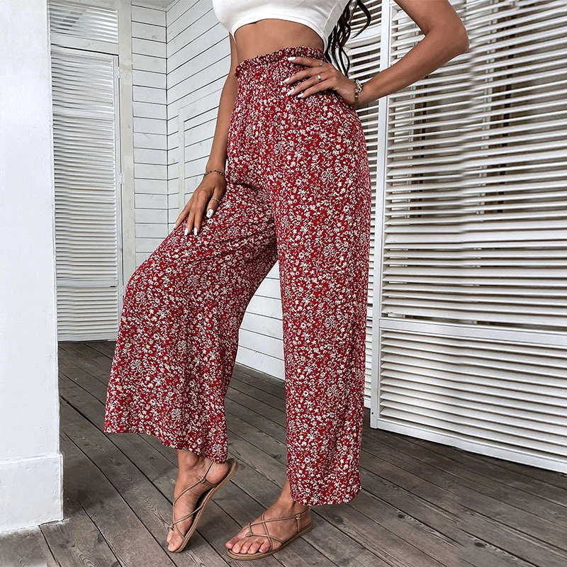 Damen Weite hochgeschnittene Palazzo‑Hose mit floralem Muster und seitlichem Beinschlitz Nord Taschen