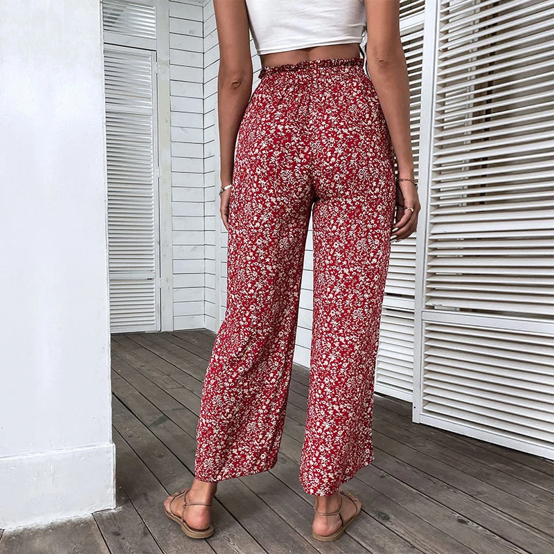 Damen Weite hochgeschnittene Palazzo‑Hose mit floralem Muster und seitlichem Beinschlitz Nord Taschen
