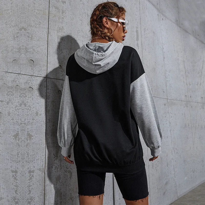 Damen Oversize Sweatshirt mit Kapuze, Kontrastärmeln und Kängurutasche Nord Taschen