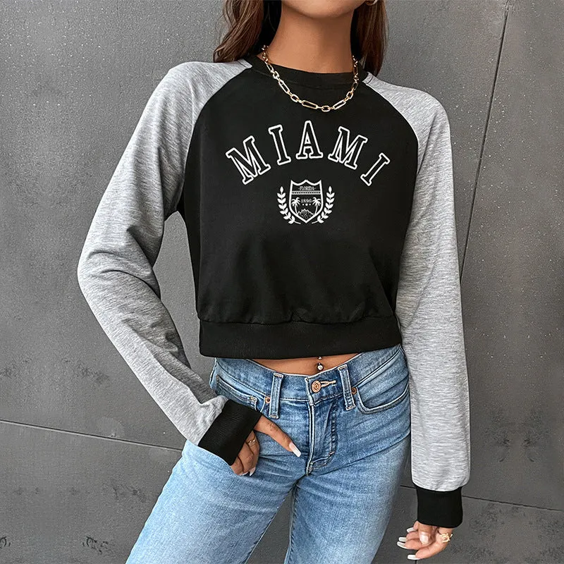 Damen Kurzgeschnittenes College-Cropped-Sweatshirt mit Raglanärmeln und elastischem Saum Nord Taschen
