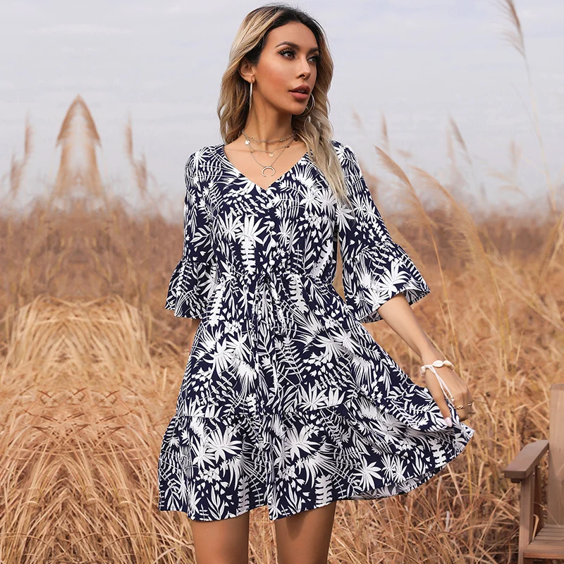 Damen V-Ausschnitt Tailliertes Sommerkleid mit Volantärmeln und tropischem Print Nord Taschen