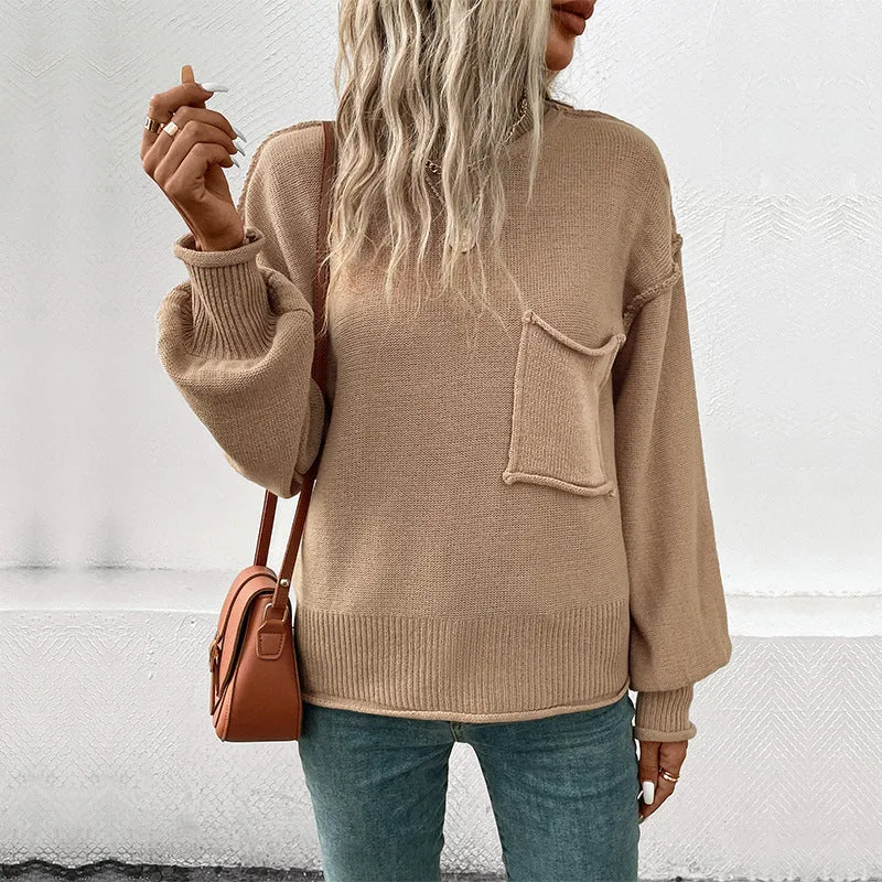 Damen Oversize Rundhals-Strickpullover mit aufgesetzter Brusttasche und fransiger Saumnaht Nord Taschen