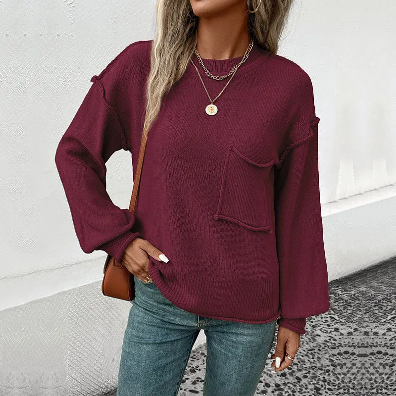 Damen Oversize Rundhals-Strickpullover mit aufgesetzter Brusttasche und fransiger Saumnaht Nord Taschen