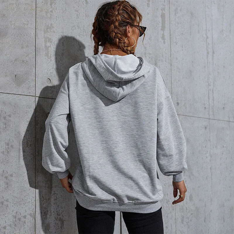Damen Oversize-Kapuzenpullover mit Kängurutasche und Schmetterling-Stickerei Nord Taschen