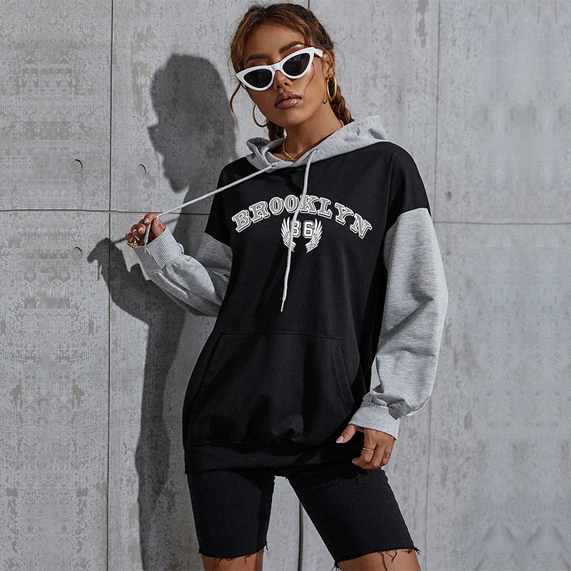 Damen Oversize-Kapuzenhoodie im Collegestyle mit Colorblock-Ärmeln, Kängurutasche und Kordelzug Nord Taschen