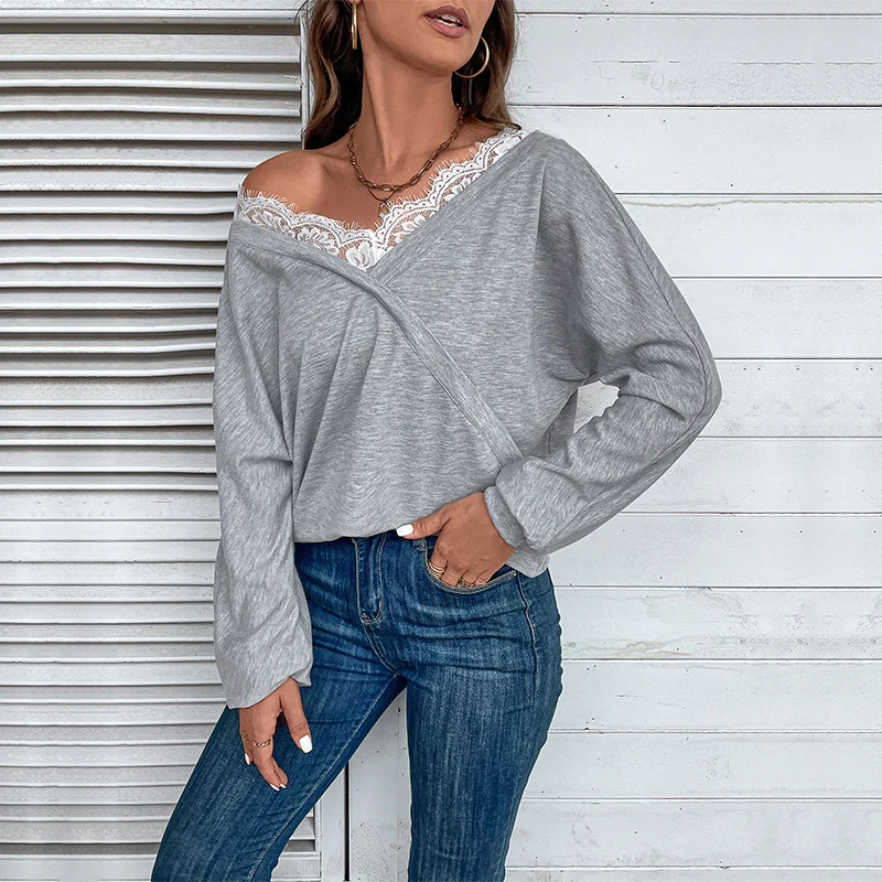 Damen Oversized Wickel-Longsleeve mit Spitzenblende und weitem Arm Nord Taschen