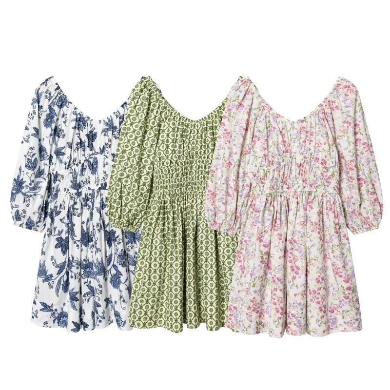 Damen Blumenkleid mit Smok-Taillierung und voluminösen Puffärmeln Nord Taschen