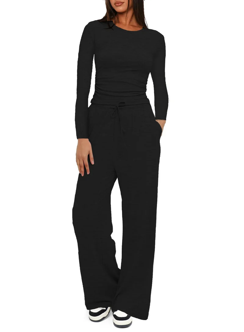 Damen Figurnahe Langarmshirt mit seitlicher Raffung und weiter Tunnelzug-Jogginghose Nord Taschen