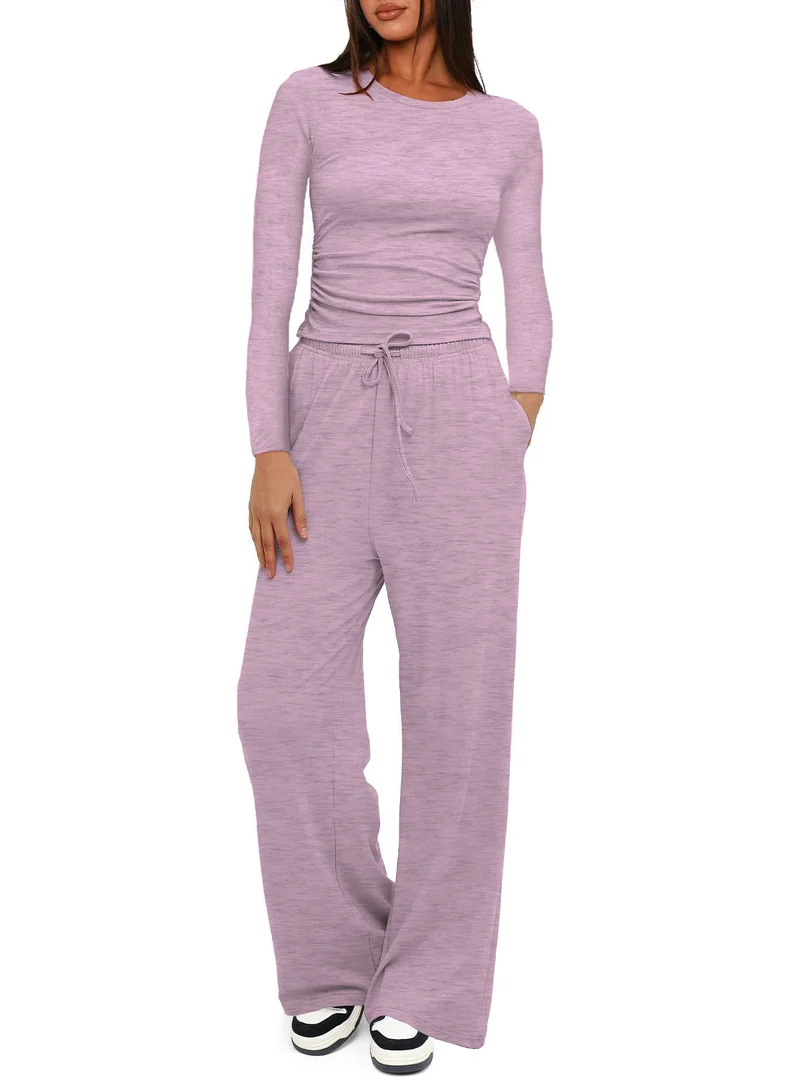 Damen Figurnahe Langarmshirt mit seitlicher Raffung und weiter Tunnelzug-Jogginghose Nord Taschen