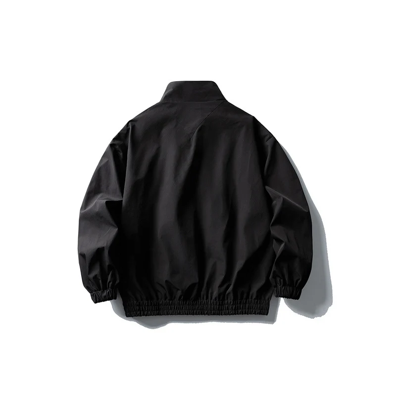 Herren Windbreaker-Jacke im Boxy‑Schnitt mit Stehkragen und elastischem Saum Nord Taschen