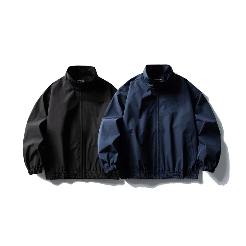 Herren Windbreaker-Jacke im Boxy‑Schnitt mit Stehkragen und elastischem Saum Nord Taschen