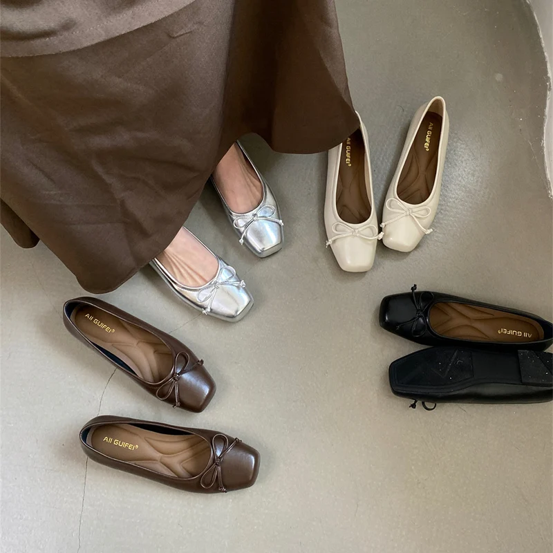 Damen klassisch geschnittene Ballerinas mit zierlichem Schleifenakzent und komfortabler Fußbettung