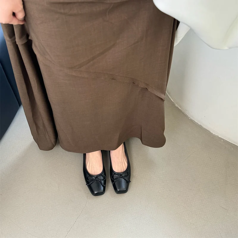 Damen klassisch geschnittene Ballerinas mit zierlichem Schleifenakzent und komfortabler Fußbettung