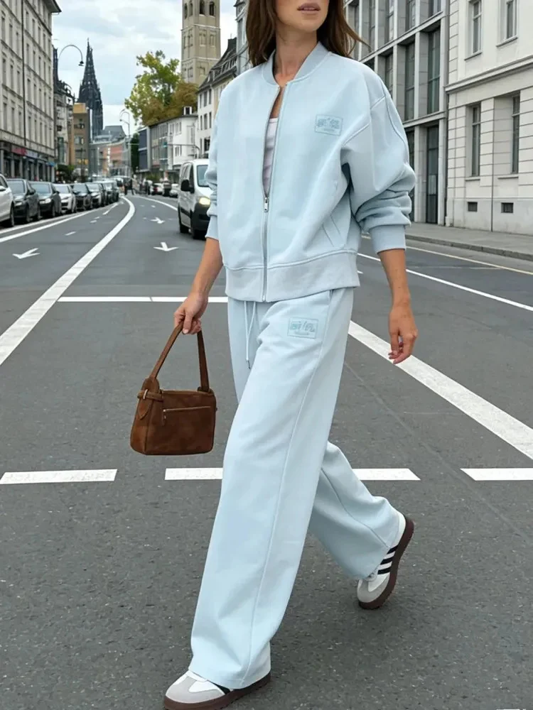 Damen Oversize Sweatjacke mit Reißverschluss und weite Jogginghose Freizeit-Set Nord Taschen