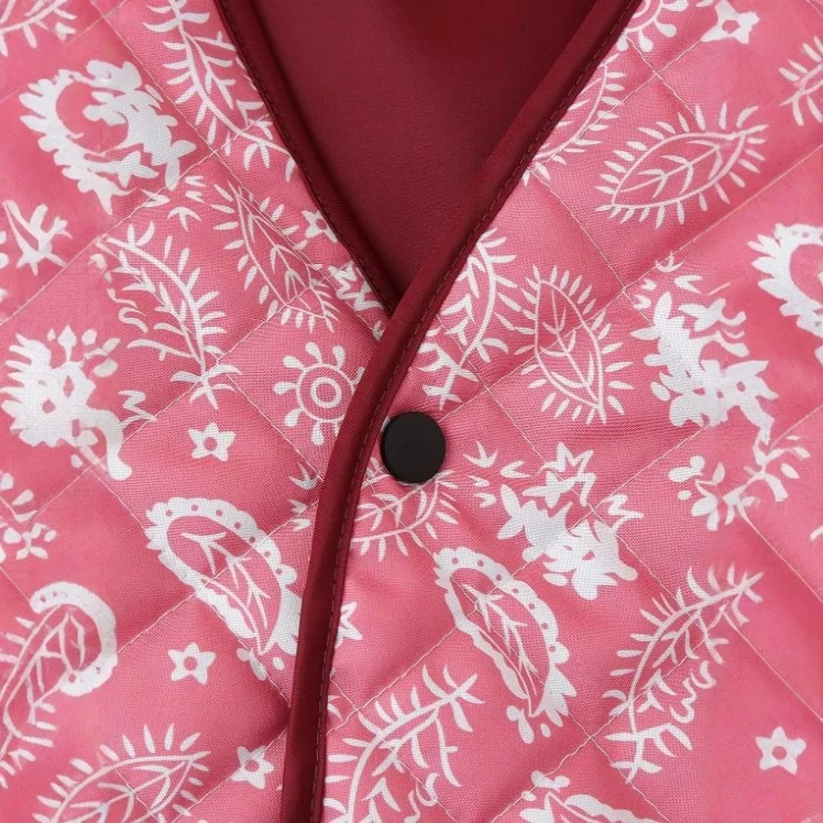 Damen gesteppte Kurzjacke mit V-Ausschnitt, Paisley‑Muster und kontrastierenden Paspeln Nord Taschen