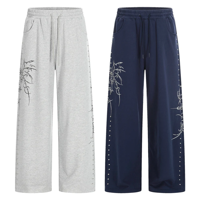 Damen Weite Sweatpants mit Tunnelzug, Ziernieten und grafischem Print Nord Taschen
