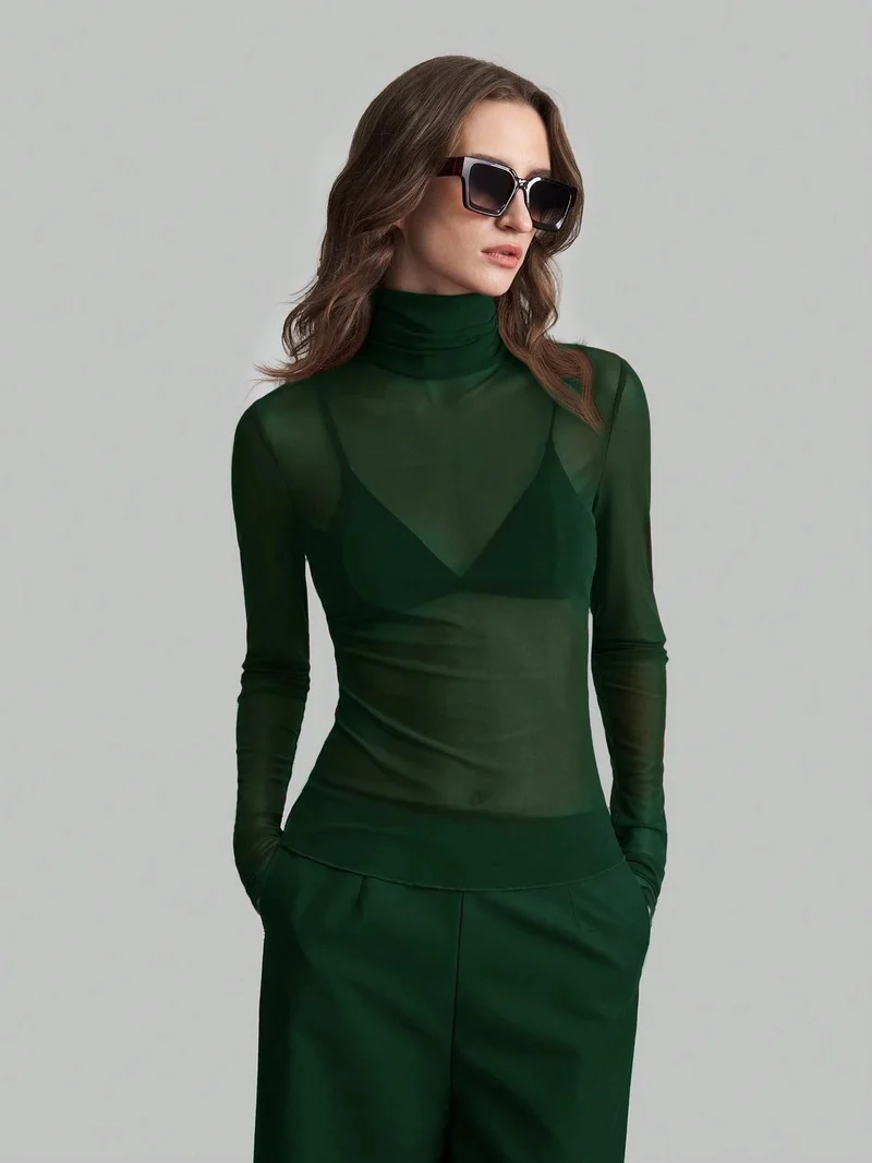 Damen Transparente Turtleneck-Bluse mit figurformendem Schnitt Arvani