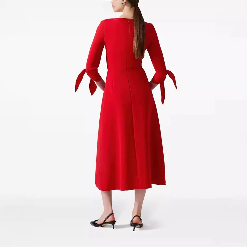 Damen Tailliertes Midikleid mit V-Ausschnitt und Schleifenmanschetten Nord Taschen