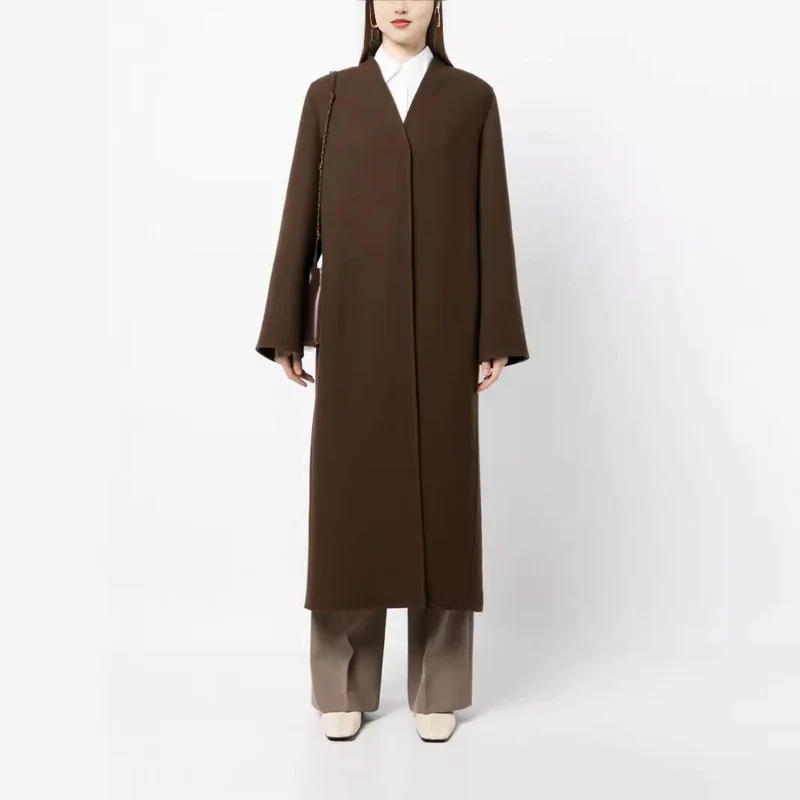 Damen Maxilanger minimalistischer Mantel mit verdeckter Front und kastiger Schulter Nord Taschen