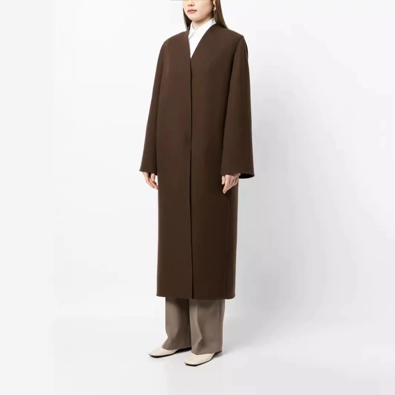 Damen Maxilanger minimalistischer Mantel mit verdeckter Front und kastiger Schulter Nord Taschen