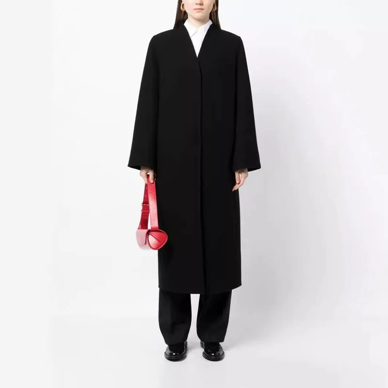 Damen Maxilanger minimalistischer Mantel mit verdeckter Front und kastiger Schulter Nord Taschen