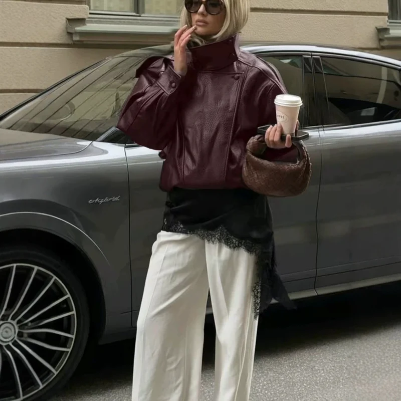 Damen Kurz geschnittener Lederblouson mit hohem Stehkragen, kastiger Silhouette und voluminösen Ärmeln Nord Taschen