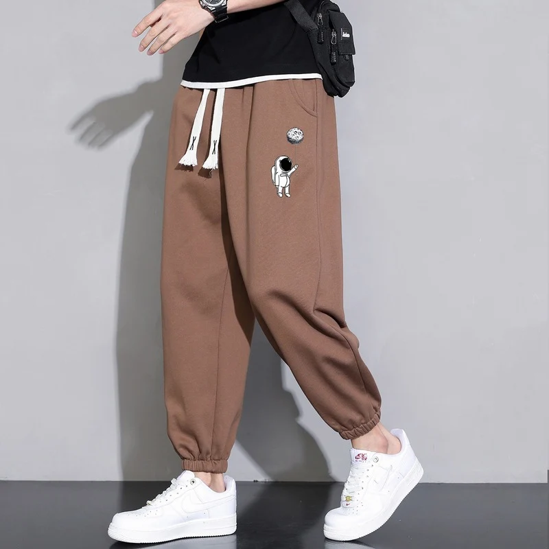 Herren Lockere Jogginghose mit Astronauten-Print, Kordelzugbund und elastischen Saumbündchen Nord Taschen