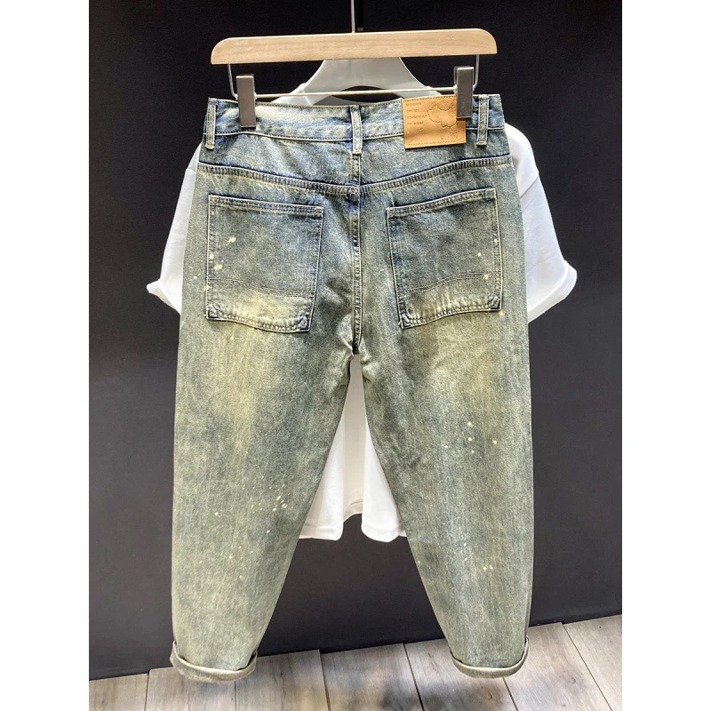 Herren Relaxed-Tapered Vintage-Jeans mit Paint‑Splatter, hohem Bund und umgeschlagenem Saum Nord Taschen