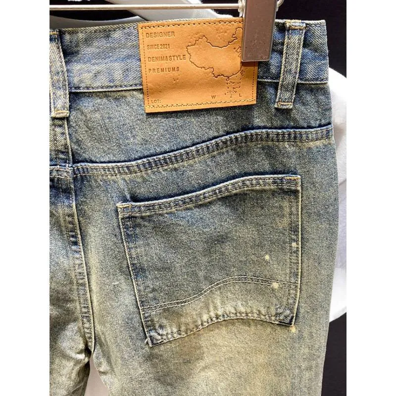 Herren Relaxed-Tapered Vintage-Jeans mit Paint‑Splatter, hohem Bund und umgeschlagenem Saum Nord Taschen