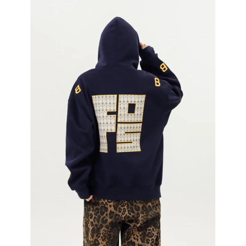 Unisex Oversized Kapuzenpullover mit großflächigem Intarsien‑Blockprint und geripptem Saum Nord Taschen