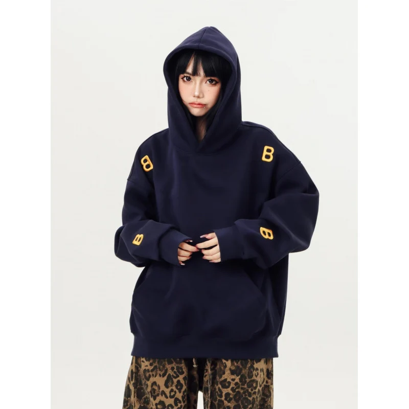Unisex Oversized Kapuzenpullover mit großflächigem Intarsien‑Blockprint und geripptem Saum Nord Taschen