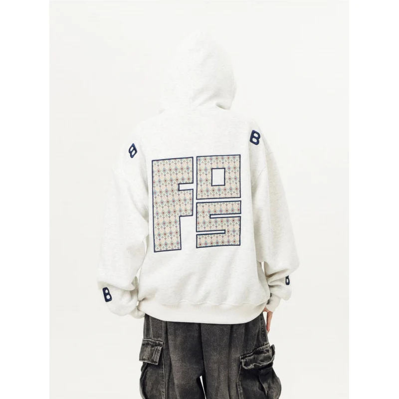 Unisex Oversized Kapuzenpullover mit großflächigem Intarsien‑Blockprint und geripptem Saum Nord Taschen