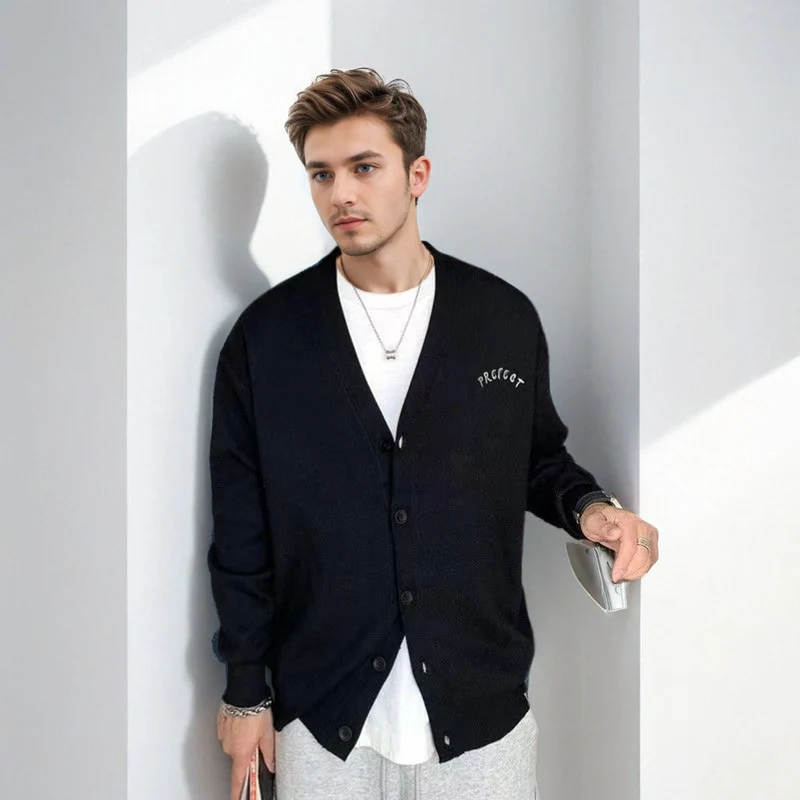 Herren Oversized-Strickpullover mit großflächigem Jacquard-Gesichtsmotiv und geripptem Saum Nord Taschen