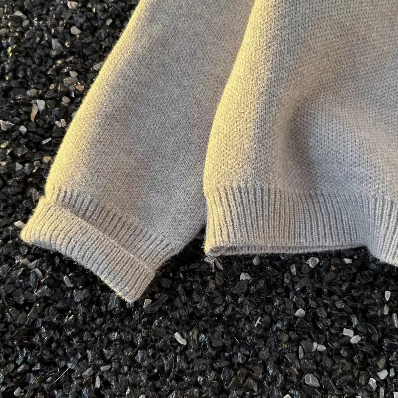 Unisex Kuscheliger melierter Feinstrick-Pullover mit Raglanärmeln und geripptem Rundhals Nord Taschen