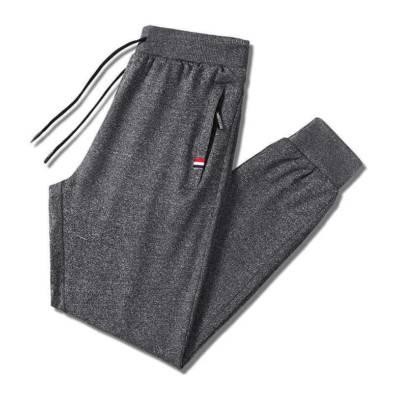 Herren Slim-Fit Jogginghose mit elastischem Rippbund, Kordelzug und Reißverschlusstaschen Nord Taschen