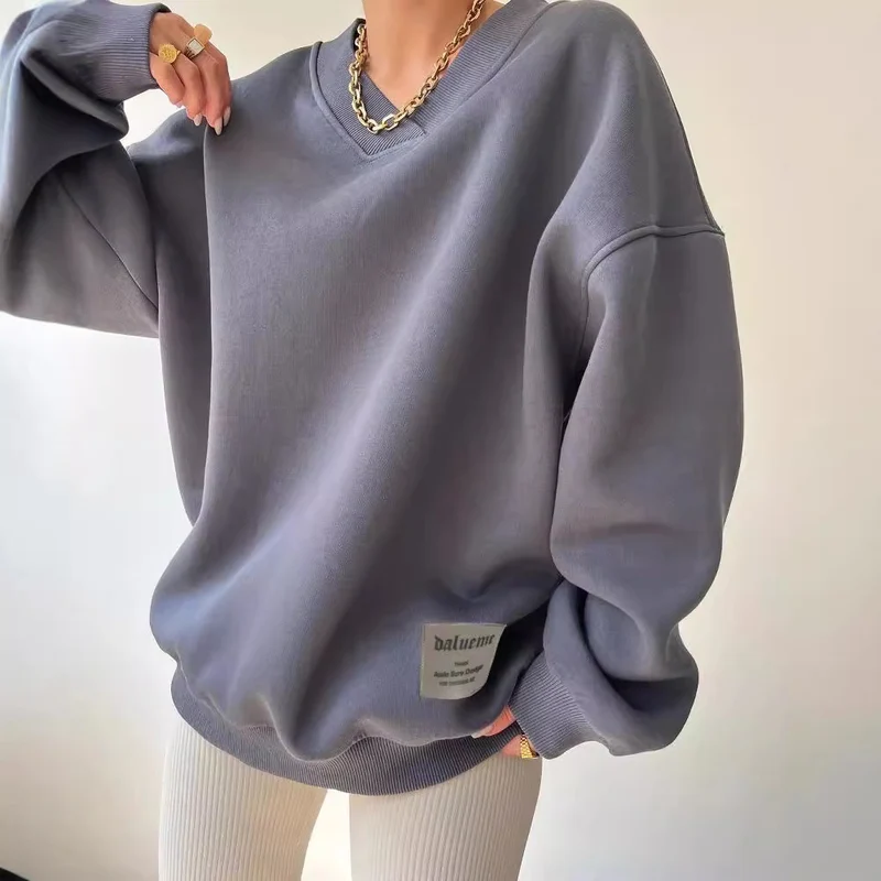 Damen Oversized Sweatshirt mit V-Ausschnitt und geripptem Kragen Nord Taschen