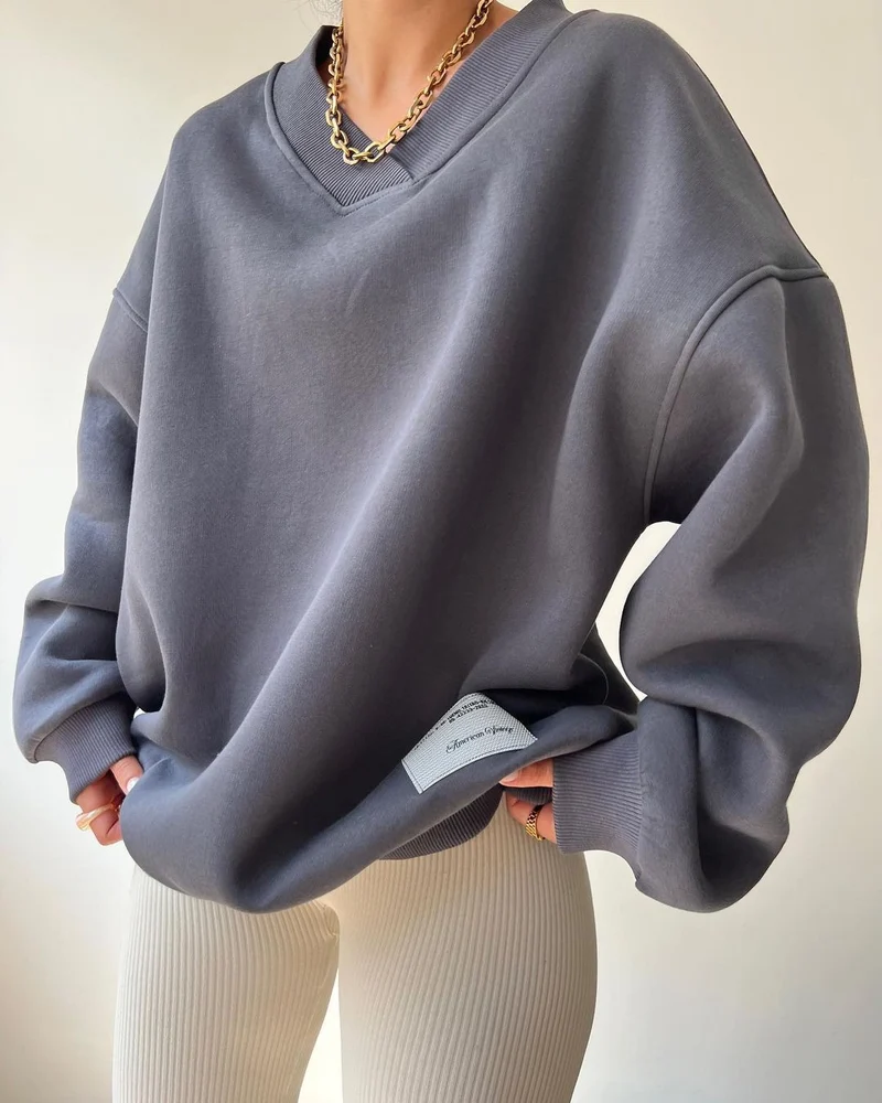 Damen Oversized Sweatshirt mit V-Ausschnitt und geripptem Kragen Nord Taschen