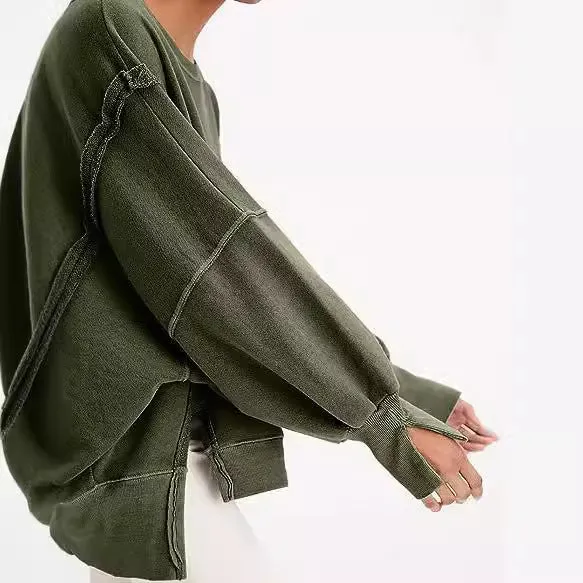 Damen Oversized Sweatshirt mit Ballonärmeln, seitlichen Schlitzen und offenen Kanten Nord Taschen