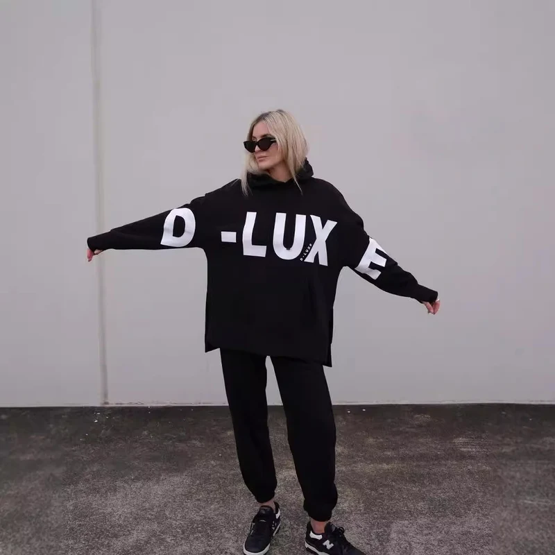 Damen Oversized Kapuzenpullover mit markantem Logoprint, Kängurutasche und Seitenschlitzen Nord Taschen