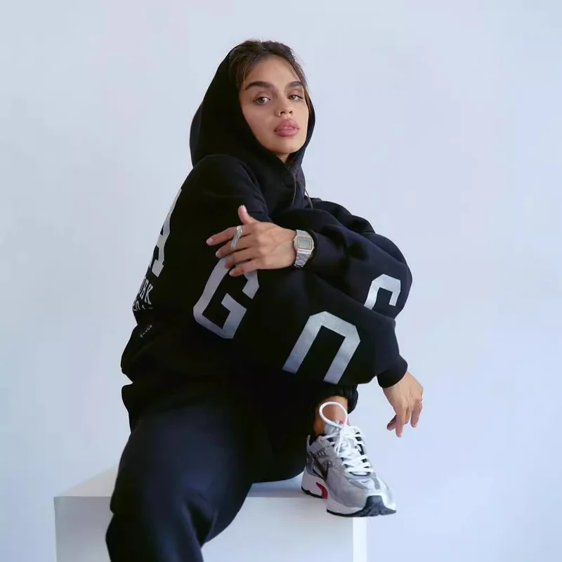 Damen Oversized Kapuzenpullover mit großflächigem Blockprint Nord Taschen