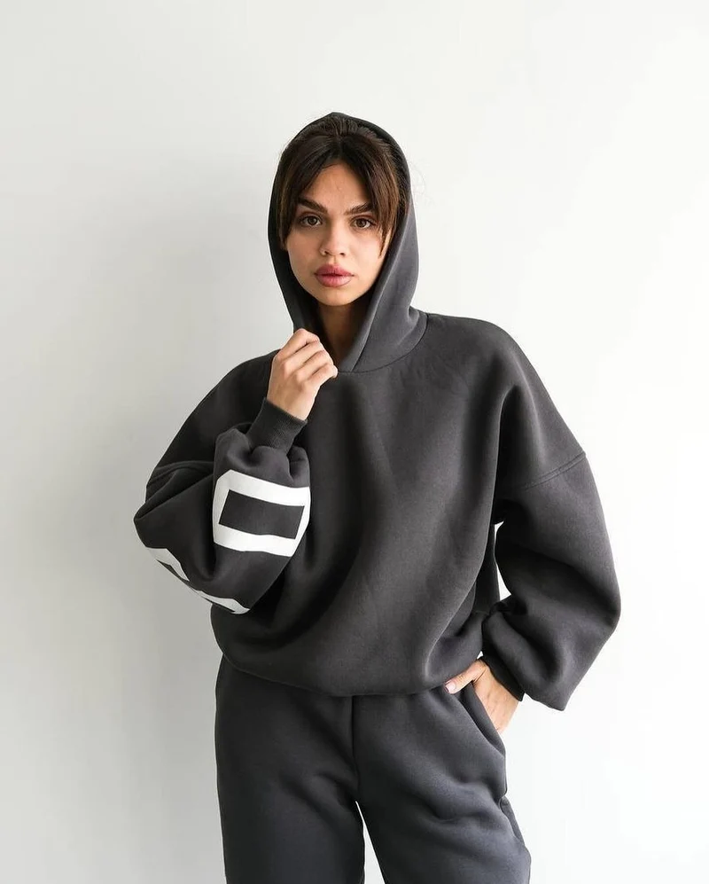 Damen Oversized Kapuzenpullover mit großflächigem Blockprint Nord Taschen
