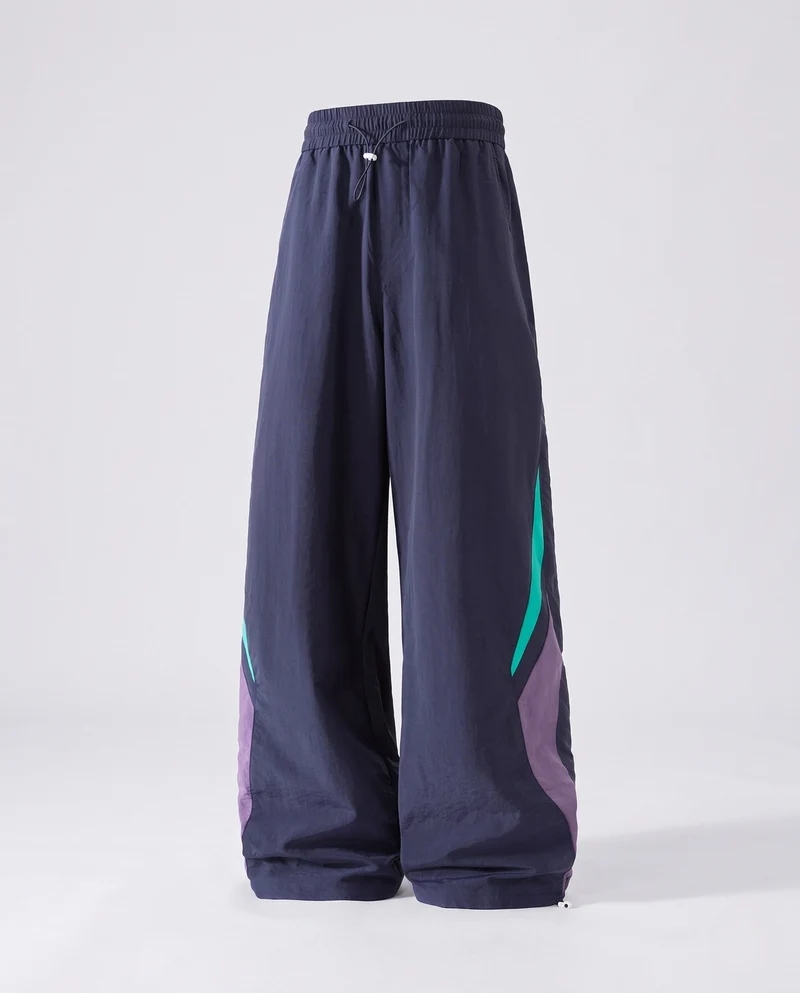 Herren Weite Nylon-Trainingshose im Retro-Sportstil mit elastischem Bund, Tunnelzug & Kontrast-Einsätzen Nord Taschen