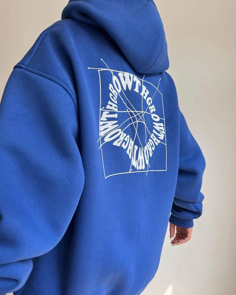 Damen Oversize Kapuzenpullover mit Grafikprint auf dem Rücken Nord Taschen