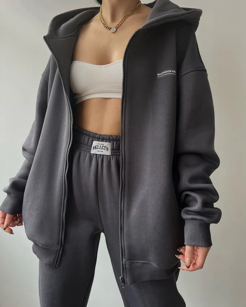 Damen Oversize Kapuzen-Sweatjacke mit Reißverschluss und High-Waist Jogginghose Set Nord Taschen
